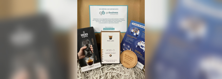 Exclusive GoBusiness merchandise like coasters, nanopresso, and coffee pods